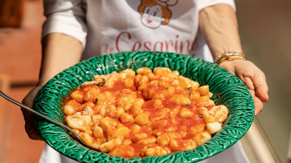 Dining experience at a local's home in Sant'Arcangelo with cooking demo