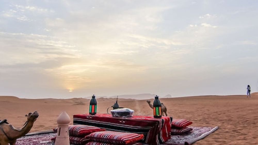 Dubai Overnight Desert Safari: Camel Ride, Sandboarding, BBQ Dinner & Breakfast