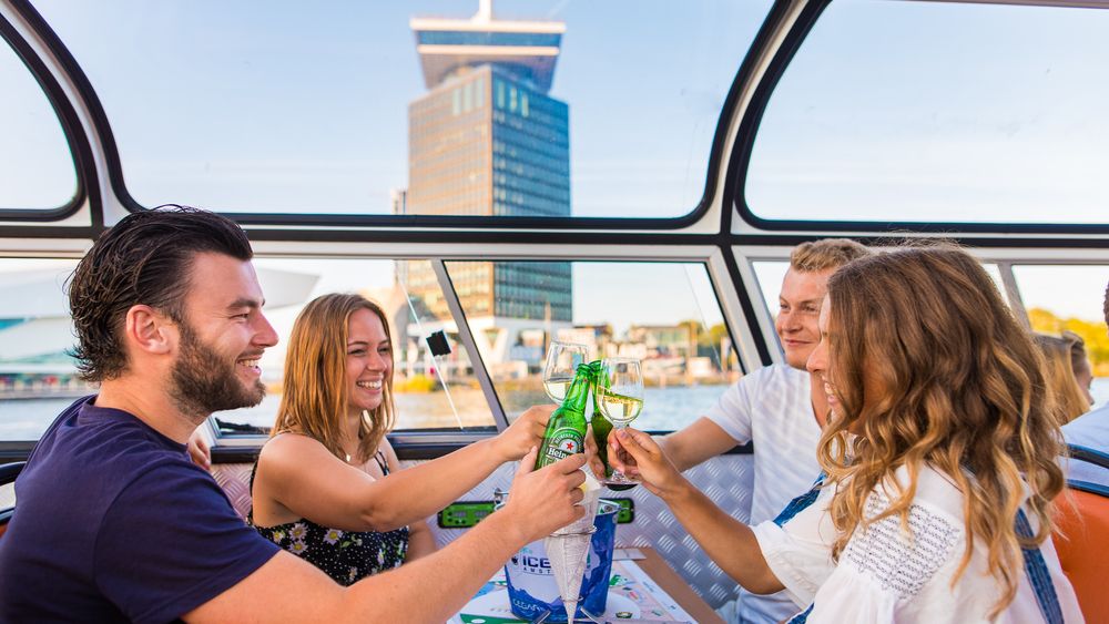 Amsterdam: Unlimited Drinks & Pizza Canal Cruise from Central Station