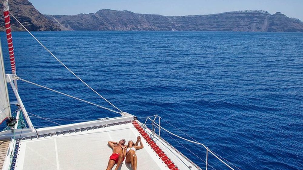 Santorini Cruise on Catamaran with BBQ & Open Bar