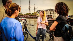 Bike Tour with canal cruise cheese and drinks included in Amsterdam Cover Image