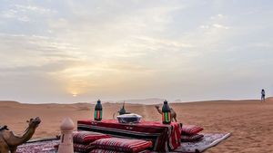 Dubai Overnight Desert Safari: Camel Ride, Sandboarding, BBQ Dinner & Breakfast Cover Image